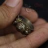 Ethnic silver alloy ring on hand – mid-20th century craftsmanship