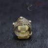 Vintage crown-shaped ethnic ring from Southeast Asia shown upright on clear stand