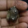Crown-shaped hill tribe ring in natural light on hand, worn as finger jewelry