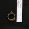 Ethnic tribal ring photographed next to ruler – measurements 34mm x 23mm x 12mm
