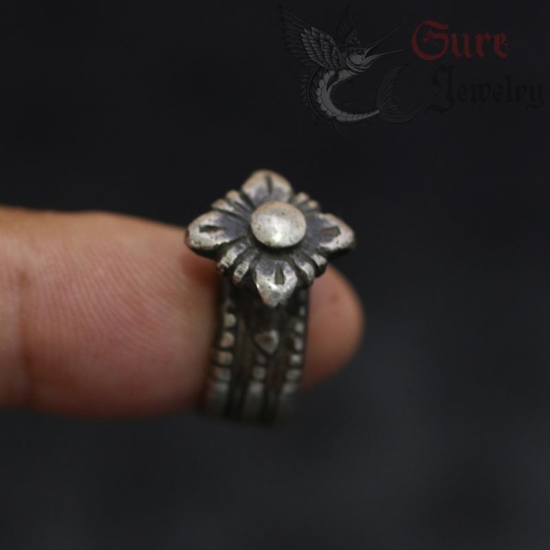 vintage shan lisu hill tribe silver ring worn on finger front view vintage shan lisu hill tribe silver ring worn on finger front view