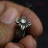 vintage shan lisu hill tribe silver ring worn on finger angled detail