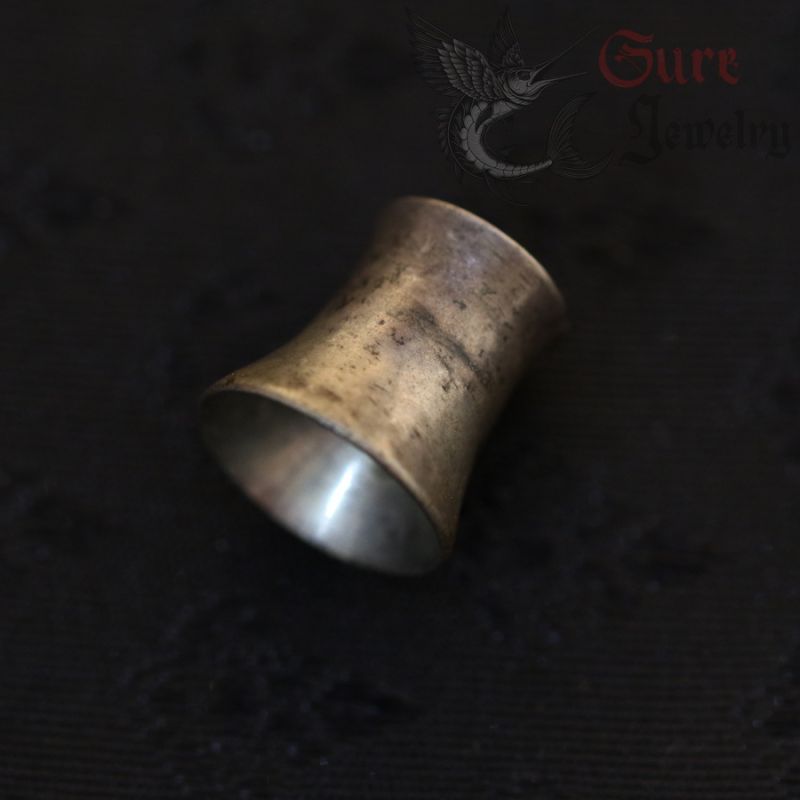 top side angle view of vintage burmese silver ear plug top side angle view of vintage burmese silver ear plug