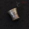 top side angle showing patina of burmese silver ear plug