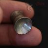 in hand view showing flare of vintage burmese silver ear plug