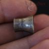 in hand view showing size of vintage burmese silver ear plug