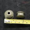 Silver ear plug from Burma placed on ruler showing 18mm earlobe size and 19mm length measurement