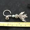 with ruler – lahu musur silver earrings shown with ruler for size reference