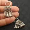in hand side angle – second side angle in hand highlighting handcrafted silver details