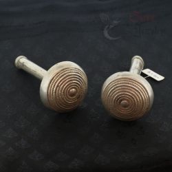 Antique Pa-O silver ear plug, top side view