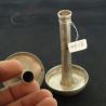 Pa-O silver ear plugs, hand-held perspective, side angle