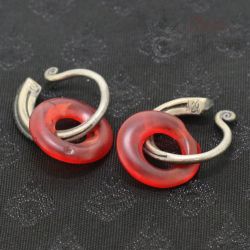 Antique Yao silver earrings with red glass circles – top side angle view