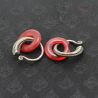 Antique Yao silver earrings with red glass circles – detailed top perspective