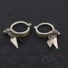 TOP SIDE ANGLE-6:  silver Yao earrings with floral finials and leaf pendants, LEFT side view.