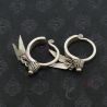 DETAIL HOOP PATTERN: Antique Yao earrings showing engraved hoop band and craftsmanship.