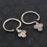 TOP SIDE ANGLE 1 – Antique Yao silver earrings spiral branch design top view