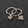TOP SIDE ANGLE 4 – Antique Yao silver earrings showing curved form
