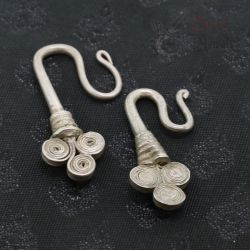 TOP ANGLE – ANTIQUE SILVER YAO EARRINGS SHOWING SPIRAL BRANCH DESIGN