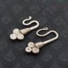 TOP ANGLE 5 – ANTIQUE YAO SPIRAL BRANCH EARRINGS, SILVER TEXTURE DETAIL
