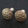 TOP SIDE ANGLE 1: ANTIQUE YAO SILVER PLUG EARRINGS TOP VIEW