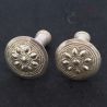TOP SIDE ANGLE 3: ANTIQUE YAO EAR PLUGS REPOUSSE WORK