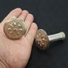 IN HAND SIDE ANGLE 3: ANTIQUE SILVER PLUG EARRING IN PALM CLOSE-UP