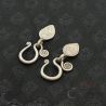 TOP ANGLE 5:
ANTIQUE YAO (MIEN) TRIBAL SILVER EARRINGS, TOP PERSPECTIVE SHOWING CRAFTSMANSHIP AND BALANCED DESIGN