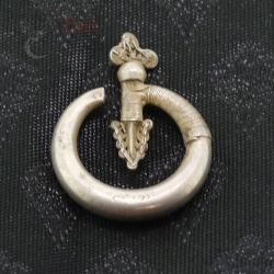 Top View 1 – Antique Yao silver earring top view showing bent arrow design and patina