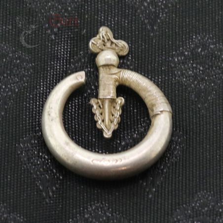 Top View 1 – Antique Yao silver earring top view showing bent arrow design and patina