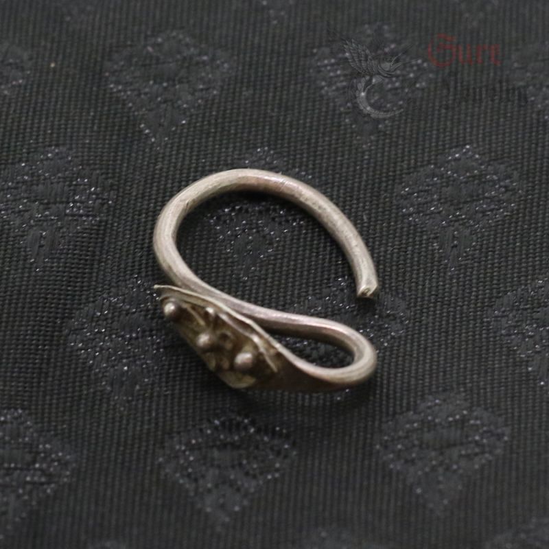 Antique Yao silver earrings top side angle – handmade hill tribe jewelry from Northern Thailand Laos region