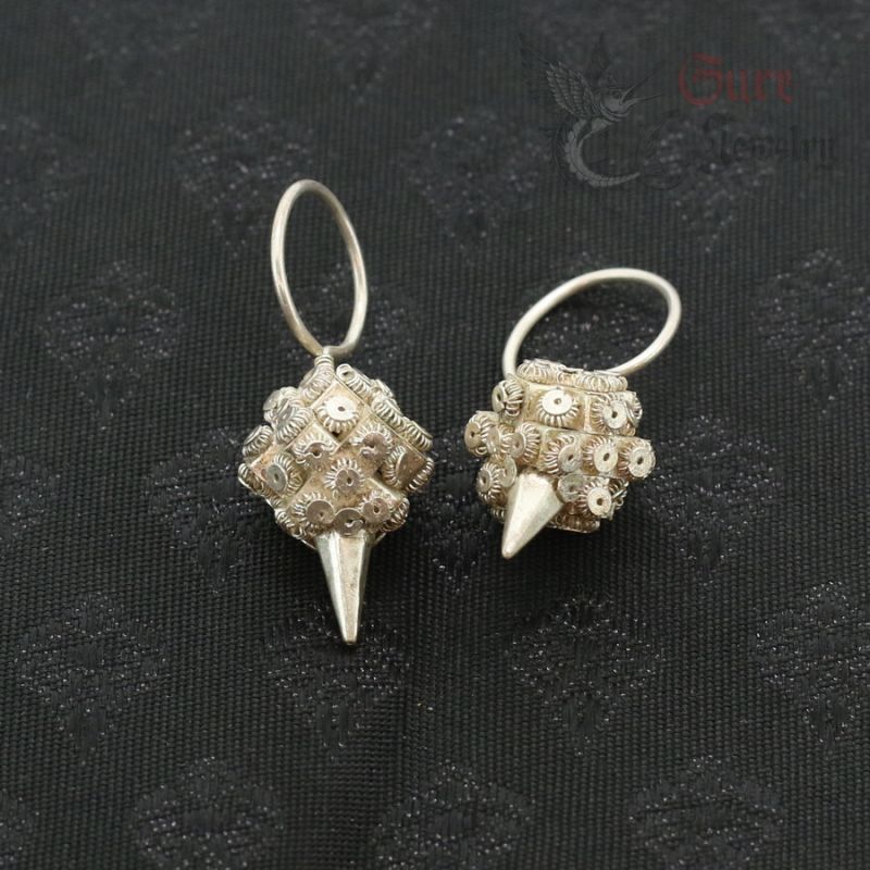 ilver Yao seed bag earrings top side angle – handmade hill tribe jewelry from Northern Thailand Laos region