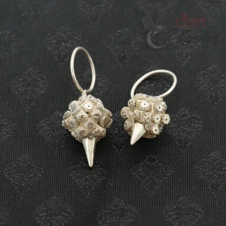 ilver Yao seed bag earrings top side angle – handmade hill tribe jewelry from Northern Thailand Laos region