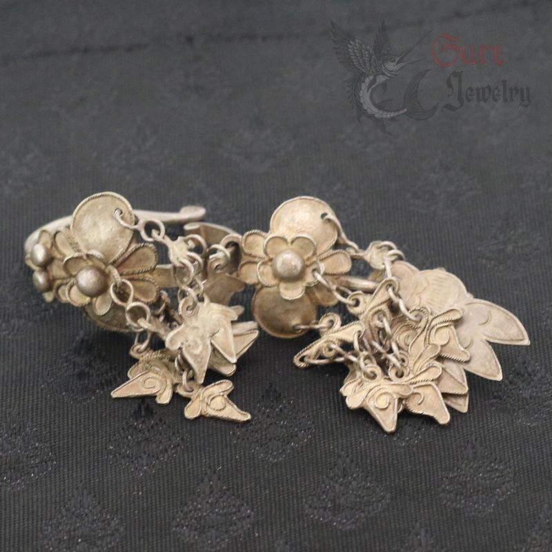 Top side angle of antique Yao silver “Super Danglings” earring, Golden Triangle tribal jewelry