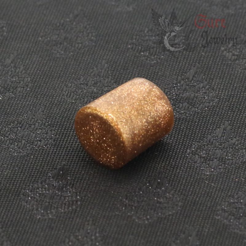 Top Angle 1: Antique Thai Yai glass ear plug, top view, Meawadee region, Burma