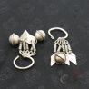 antique yao silver bell earrings closeup