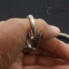 SIDE ANGLE IN HAND – ANTIQUE TRIBAL SILVER JEWELRY DETAIL DONG