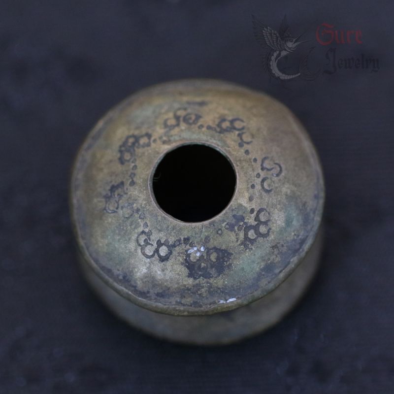 TOP SIDE ANGLE – 1: ANTIQUE KAREN SILVER EAR PLUG TOP VIEW WITH PATINA