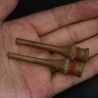 antique karen long wooden ear plugs in hand view