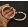 TRADITIONAL HILLTRIBE HOLLOW SILVER CUFF HELD IN HAND FOR SCALE