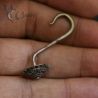 vintage northern thailand earring in hand photo