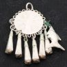 Antique Yao Muser silver alloy pendant top angle photograph