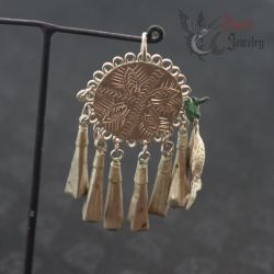 Antique tribal silver pendant hanging display side angle