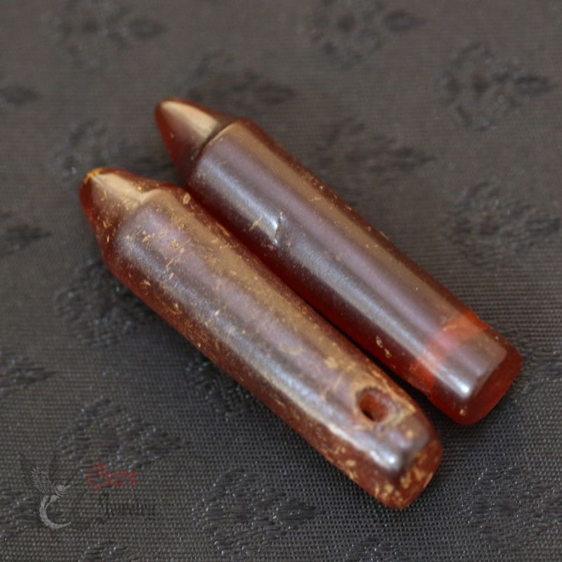 old burmese amber ear plugs patlokas top view