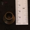 Karen hill tribe ear plug with ruler showing length measurement