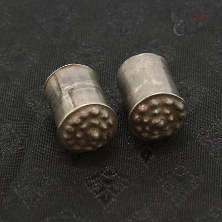 Traditional silver ear plugs from Myanmar, Mon Karen tribal jewelry, top side view
