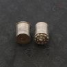 Old silver tribal ear plugs from Burma, chedi inspired form, top angle view