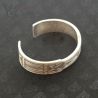 Lahu Musur silver bangle top view showing engraved surface and open cuff design