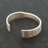 Ethnic Lahu Musur silver bracelet top angle highlighting handcrafted finish