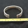 Tribal silver bangle measurement reference photographed with ruler