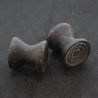 Antique Dayak ironwood ear plugs pair Borneo tribal jewelry top side angle 1